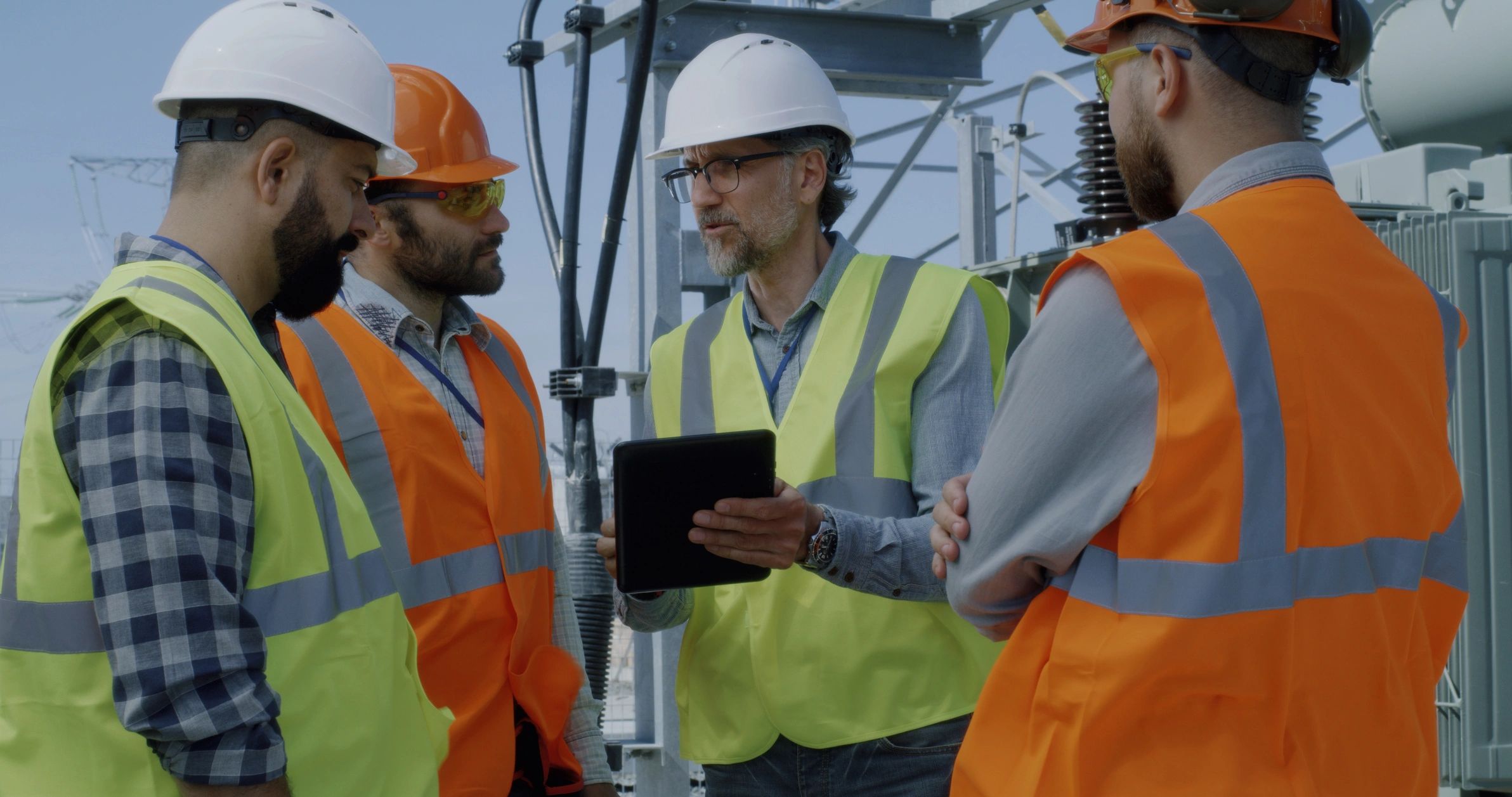 Engineering professional in hard hat at an industrial facility